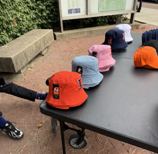 My Dad's Bucket Hat Craze: One Man's Quest for Collegiate Headwear