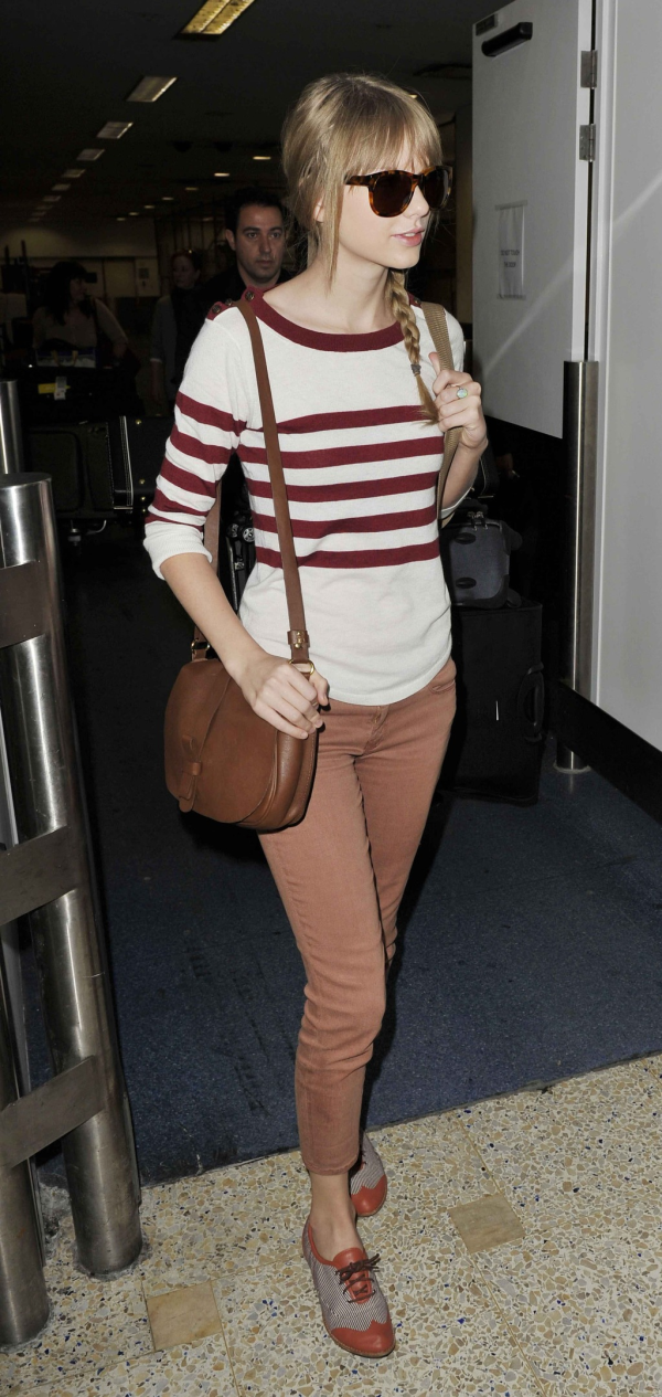 Taylor Swift's Airport Fashion: The Perfect Complement to Her Flawless Beauty