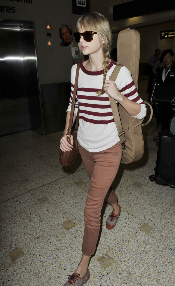 Taylor Swift's Airport Fashion: The Perfect Complement to Her Flawless Beauty