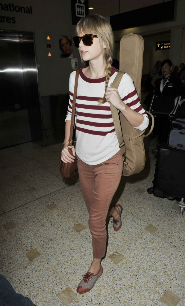 Taylor Swift's Airport Fashion: The Perfect Complement to Her Flawless Beauty